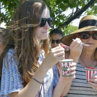 <p>Laureen (right) and Emu Haynes, of Westport, enjoy a cool Italian ice on one of the hottest days of the year.</p>