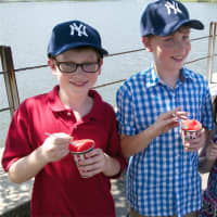 <p>From left: Gabriel, Thomas and Megan Sargent, of Westport, enjoy an Italian ice on a scorching hot day in Westport. </p>