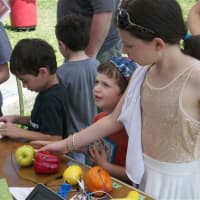<p>Children&#x27;s activities at the library included playing musical notes on fruits and vegetables.</p>