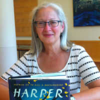 <p>Maria Higbie, a clerk at Greenwich Library, shows off Harper Lee&#x27;s new book, &quot;Go Set a Watchman.&quot; </p>