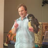 <p>A spectacled owl visits the library as a part of Animal Embassy.</p>