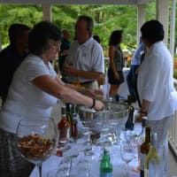 <p>Attendees and refreshments at Friends of Karen&#x27;s open house in North Salem on Thursday.</p>