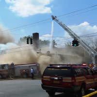 <p>Smoke filled the area in Mount Vernon as firefighters fought the blaze.</p>