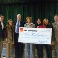 <p>From left: Daily Voice President John Falcone, Daily Voice sales rep Donna Herman, Entergy&#x27;s Jim Steets, Principal Patricia McIlvenny-Moore, parent Marlene Maccarrone, PTA President Diane Kness and Lakeland Superintendent George Stone.</p>