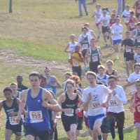 <p>Wilton&#x27;s Aaron Breen runs in a crowd at the outset of Sunday&#x27;s race.</p>