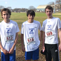 <p>Wilton runners (left to right) Ben Ruffing, Owen Callahan and Aaron Breen get together before their race.
</p>