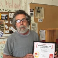 <p>Timothy Larkin of Timothy&#x27;s in Bridgeport, with the DVlicious ice cream certificate.</p>