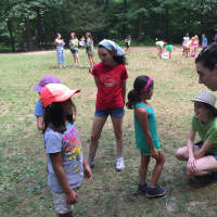 <p>Campers enjoy a temperate summer day at Camp Aspetuck on Wednesday. </p>