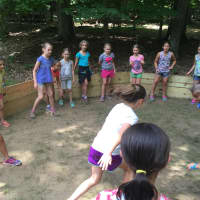 <p>Girls hit the Gaga Ball Pit at Camp Aspetuck in Weston on Wednesday. </p>