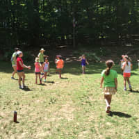 <p>Campers hit the field for games at Camp Aspetuck.</p>