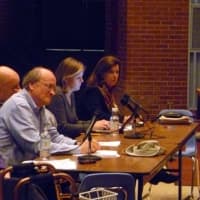 <p>Members of the Facilities Reconfiguration Committee listen to Ridgefield parents and residents concerns Monday night at a public hearing regarding a school closure.</p>