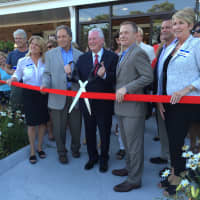 <p>First Selectman Michael Tetreau along with local leaders and hotel owners cut the ribbon on the new Fairfield Circle Inn on Thursday eveing.</p>