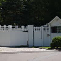 <p>Hillary Clinton&#x27;s home in Chappaqua is buffered by an entrance gate. Westchester County Rob Astorino appeared in the neighborhood for a Friday press conference.</p>