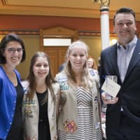 <p>State Rep. Cristin McCarthy-Vahey, a pair of Girl Scouts and state Rep. Jesse MacLachlan. </p>
