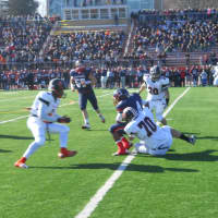 <p>Robbie Lorden of White Plains tackles Stepinac&#x27;s Ryan Burnett. Stepinac scored in the game&#x27;s final minute to pull out a 19-18 win in the 42nd annual Turkey Bowl.</p>