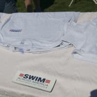 <p>Bumper stickers and T-shirts were handed out to participants.</p>