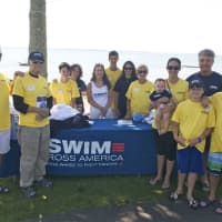 <p>Swim Across America volunteers pose for a photo at Saturday&#x27;s event at the Larchmont Shore Club.</p>