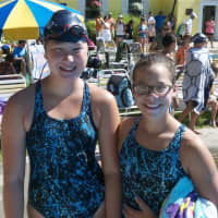 <p>Two Cortlandt swimmers pose for a photo prior to their race.</p>