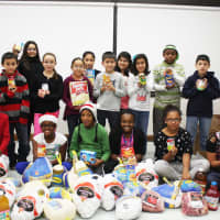 <p>Students at Hillcrest Elementary School in Peekskill gathered food for needy families this Thanksgiving.</p>