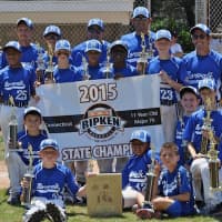 <p>The Norwalk 11-year-old All-Stars celebrate after winning the state championship.</p>