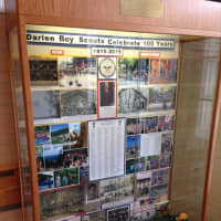 <p>Photos and scouting materials from the Darien Boy Scouts are on display at Town Hall.</p>