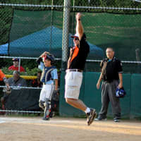 <p>White Plains&#x27; 12 and under team scores during the Division Championship game on July 16.</p>