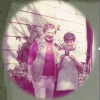 <p>Herb and his mother in 1974, showing off a medal from a cross country race in his backyard. Kerry  McCaffrey coaches girls&#x27; softball and a coed cross country team at Mountain View Middle School in New Jersey.</p>