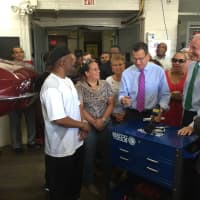 <p>Gov. Dannel Malloy announces his endorsement for Bridgeport Mayor Bill Finch&#x27;s re-election campaign in a garage filled with classic cars and a crowd chanting four more years.</p>