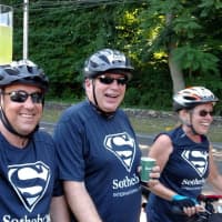 <p>Team Sotheby&#x27;s riders enjoy the ride on Saturday.</p>