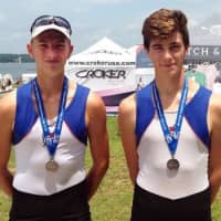 <p>Chris Martensson and Kaare Andersen of Norwalk River Rowing with their silver medals at the Club National Championships.</p>