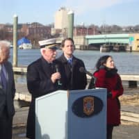 <p>Norwalk Fire Chief Denis McCarthy and other officials gather at the commissioning of the Robert Bedell.</p>