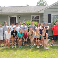 <p>GE Risk Management Program interns and two staff members volunteered to scrape and paint the exterior and trim of a STAR group home.</p>