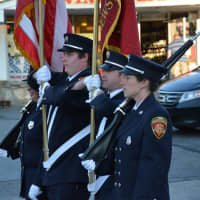 <p>Brewster firefighters march in their local parade.</p>