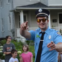 <p>Danbury firefighter Brian Reilly poses for a photo at the Brewster parade.</p>