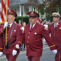 <p>Buchanan firefighters march in the Carmel parade.</p>