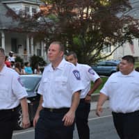 <p>Mount Kisco Volunteer Ambulance Corps members march in the Brewster parade.</p>