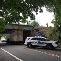 <p>The moving truck failed to make the clearance at Tomac Avenue of 10 feet, 5 inches. </p>
