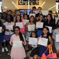<p>The Ossining students show off the certificates of completion. </p>