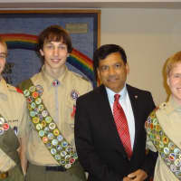 <p>Yorktown council member Vishu Patel presented the newly-minted Eagle Scouts with certificates.</p>