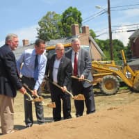 <p>CIFC board chair Frank Muska, Gov. Dannel Malloy, Mayor Mark Boughton and CIFC President James Maloney turn over a ceremonial shovel full of dirt at the groundbreaking of a new Community Health Center on Main Street in Danbury. </p>