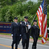 <p>Bedford firefighters march in their parade.</p>
