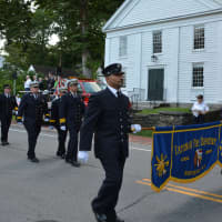 <p>Katonah firefighters march in the Bedford Village parade.</p>