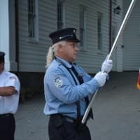 <p>A Banksville firefighter marches in the Bedford Village parade.</p>