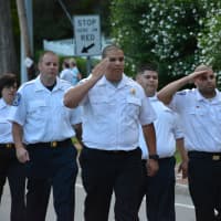 <p>Members of the Mount Kisco Volunteer Ambulance Corps (MKVAC) parade in the parade.</p>