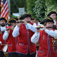 <p>Mount Kisco Fife and Drum members march in the Bedford Village parade.</p>