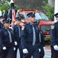 <p>Noroton Heights (Darien) firefighters march in the Bedford Village parade.</p>