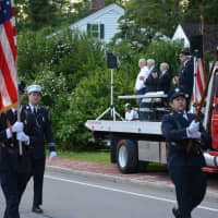 <p>Town of Mamaroneck firefighters march in the Bedford Village parade.</p>
