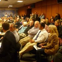<p>A crowd of Cos Cob residents listens to deliberations over a proposed synagogue on Orchard Street in Greenwich Town Hall on Tuesday.</p>