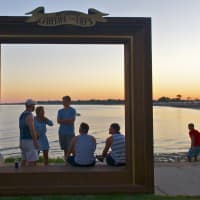 <p>An oversized Gathering of the Vibes frame shows off the picture-perfect setting for the four-day Vibes festival.</p>
