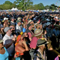 <p>A massive crowd watches the main stage Friday at Gathering of the Vibes.</p>